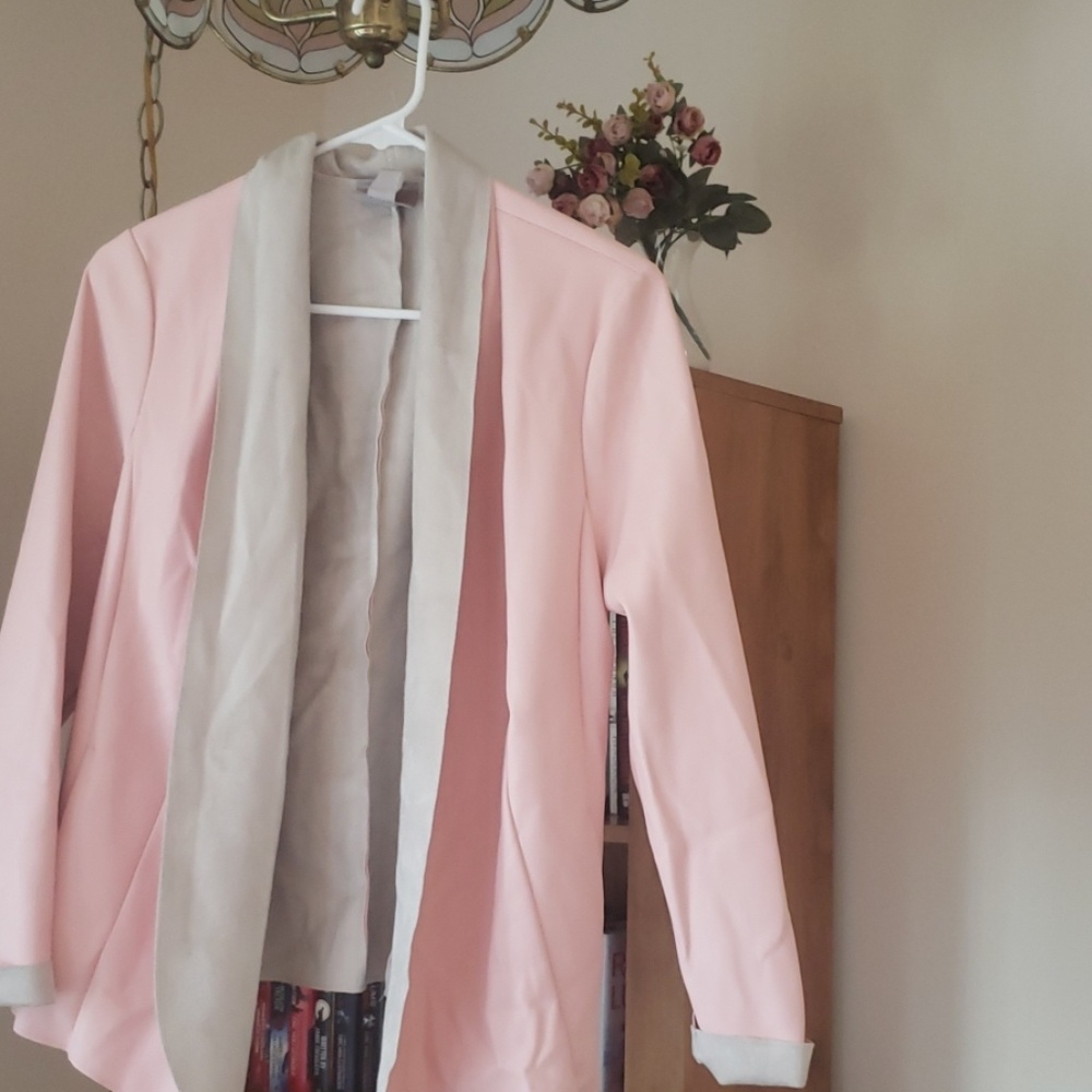 Pink leather like blazer with soft gray lining